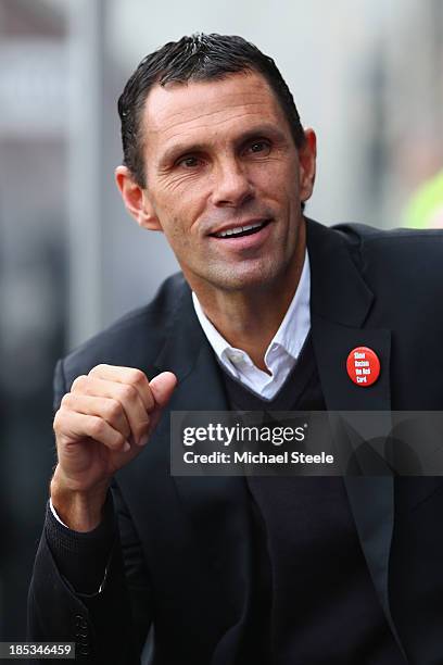 Gus Poyet the manager of Sunderland looks on from the dugout during the Barclays Premier League match between Swansea City and Sunderland at the...