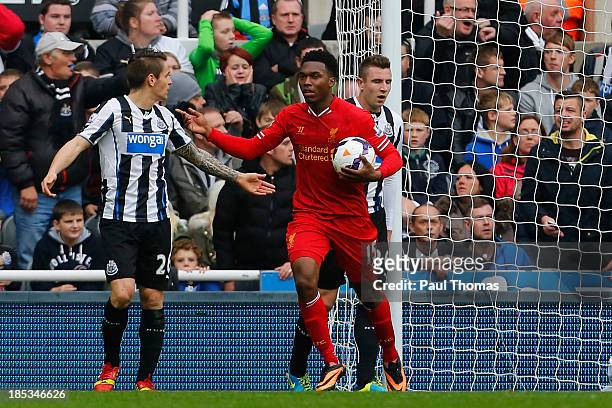 Daniel Sturridge of Liverpool celebrates his goal during the Barclays Premier League match between Newcastle United and Liverpool at St James' Park...
