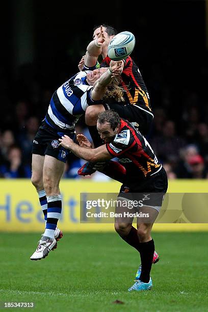 Tom Biggs of Bath goes up for a high ball against Will Harries of Newport during the Amlin Challenge Cup match between Bath and Newport Gwent Dragons...