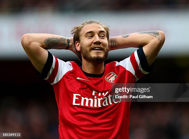Nicklas Bendtner of Arsenal reacts during the Barclays Premier League match between Arsenal and Norwich City at Emirates Stadium on October 19, 2013...