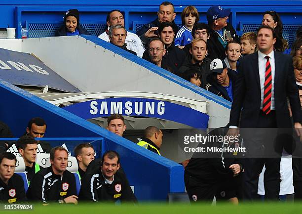 Chelsea manager Jose Mourinho sits in the stands after being sent off during the Barclays Premier League match between Chelsea and Cardiff City at...