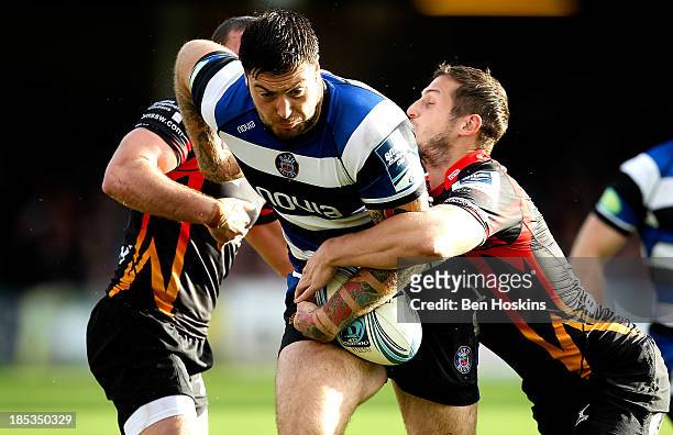 Matt Banahan of Bath attempts to break through the Newport defence during the Amlin Challenge Cup match between Bath and Newport Gwent Dragons at...