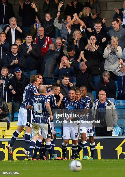 Scott McDonald of Millwall FC celebrates scoring during the Sky Bet Championship match between Millwall and Queens Park Rangers at The Den on October...
