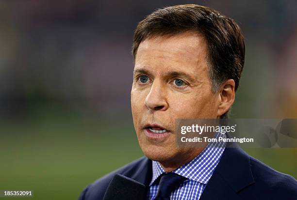 Sportscaster Bob Costas works on the sidelines before the Dallas Cowboys take on the Washington Redskins at AT&T Stadium on October 13, 2013 in...
