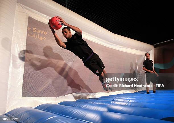 The goalkeepers of the UAE U-17 team the 'Young Whites' are tested by their teamates on the 'Super Save' game on a suprise visit to the FIFA U-17...