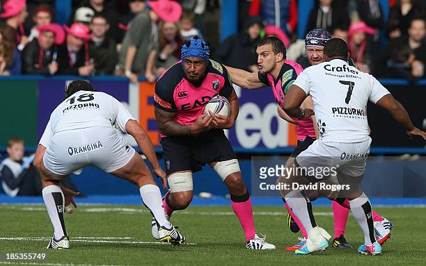 Filo Paulo of Cardiff runs with the ball during the Heineken Cup pool 2 match between Cardiff Blues and Toulon at Cardiff Arms Park on October 19,...