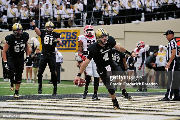 Quarterback Patton Robinette of the Vanderbilt Commodores scores a touchdown against the Georgia Bulldogs at Vanderbilt Stadium on October 19, 2013...