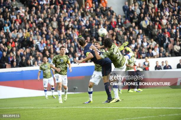 Paris Saint-Germain's Swedish forward Zlatan Ibrahimovic kicks the ball to score during the French L1 football match Paris Saint Germain against...