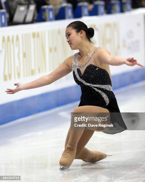 Caroline Zhang of the USA performs during the ladies short program of day two at Skate America at Joe Louis Arena on October 19, 2013 in Detroit,...