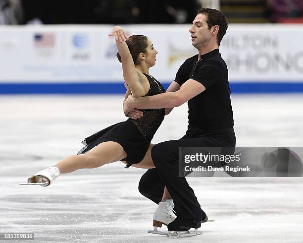 Marissa Castelli and Simaon Schnapir of the USA perform during the pairs short program of day two at Skate America at Joe Louis Arena on October 19,...