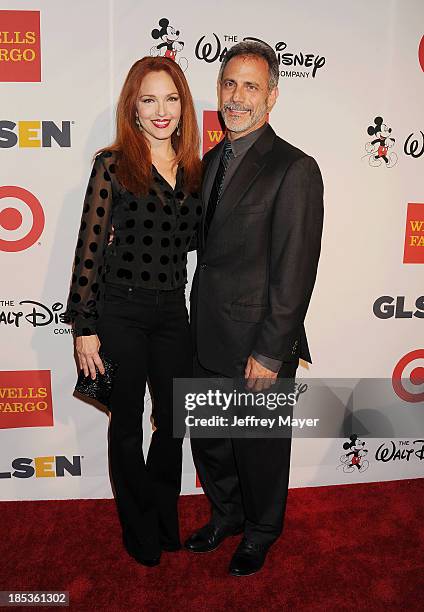 Actress Amy Yasbeck and Michael Plonsker attend the 9th Annual GLSEN Respect Awards held at the Beverly Hills Hotel on October 18, 2013 in Beverly...