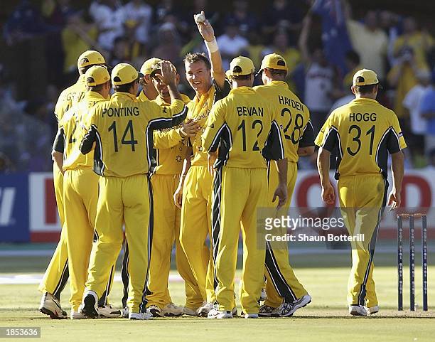 Brett Lee of Australia celebrates taking five wickets during the ICC Cricket World Cup 2003 Super Sixes match between Australia and New Zealand held...