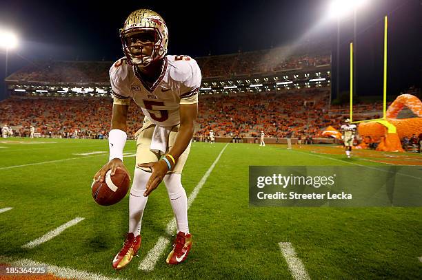 Jameis Winston of the Florida State Seminoles warms up before their game against the Clemson Tigers at Memorial Stadium on October 19, 2013 in...