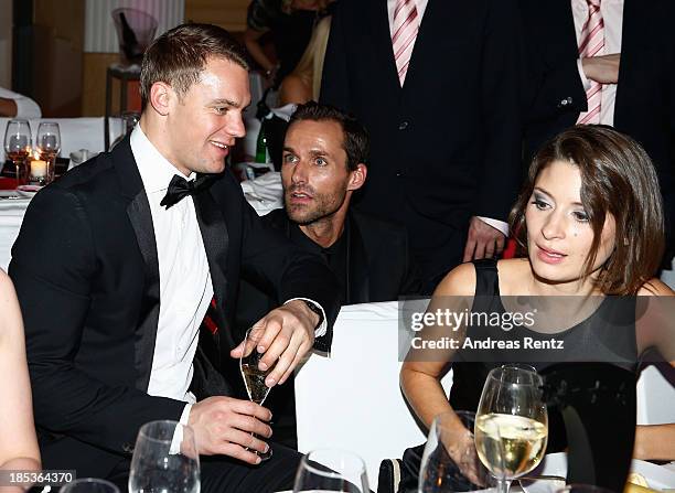 Manuel Neuer, Sven Hannawald and Kathrin Gilch attend the 7th Audi Generation Award 2013 at Hotel Bayerischer Hof on October 19, 2013 in Munich,...