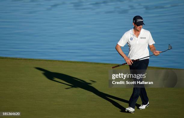 Webb Simpson walks across the 16th green during the third round of the Shriners Hospitals for Children Open at TPC Summerlin on October 19, 2013 in...