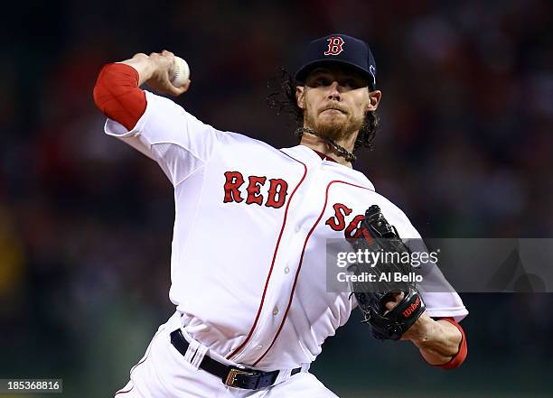 Clay Buchholz of the Boston Red Sox throws a pitch in the first inning against the Detroit Tigers during Game Six of the American League Championship...