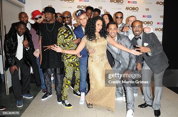 Kanya King MBE poses with So Solid Crew at the 18th anniversary MOBO Awards at The Hydro on October 19, 2013 in Glasgow, Scotland.