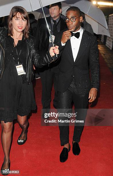 Tinie Tempah arrives rain-soaked at the 18th anniversary MOBO Awards at The Hydro on October 19, 2013 in Glasgow, Scotland.