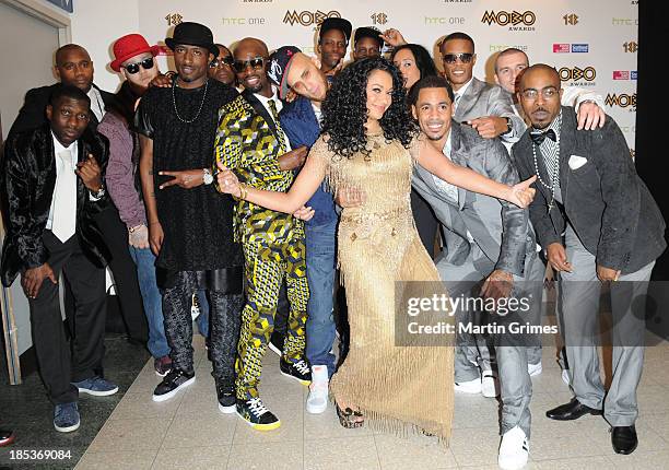 Kanya King MBE poses with So Solid Crew at the 18th anniversary MOBO Awards at The Hydro on October 19, 2013 in Glasgow, Scotland.