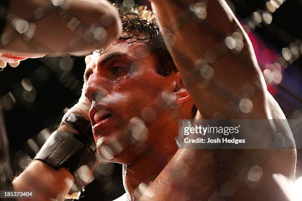 George Sotiropoulos stands in his corner after being defeated by KJ Noons in their UFC lightweight bout at the Toyota Center on October 19, 2013 in...