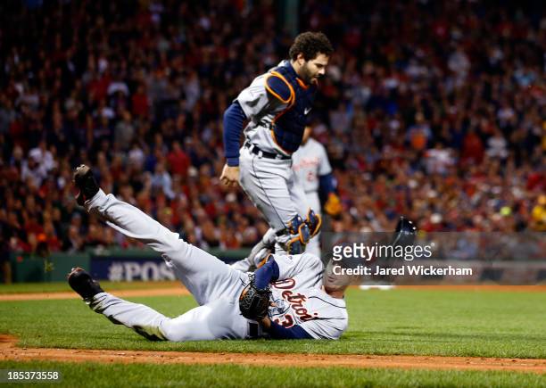 Max Scherzer of the Detroit Tigers catches a bunted ball in the third inning hits a by Shane Victorino of the Boston Red Sox during Game Six of the...