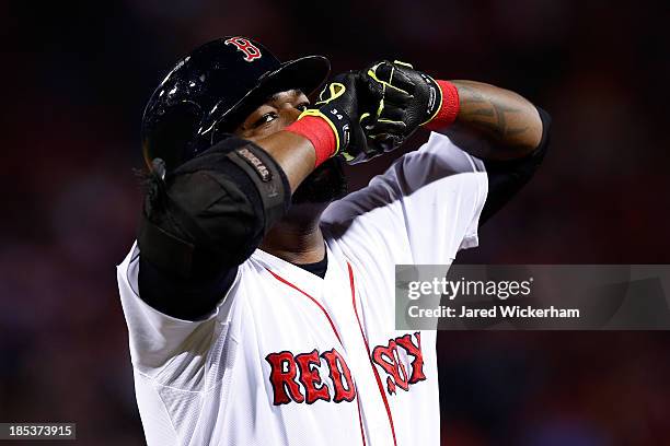 David Ortiz of the Boston Red Sox reacts in the fourth inning against Max Scherzer of the Detroit Tigers during Game Six of the American League...