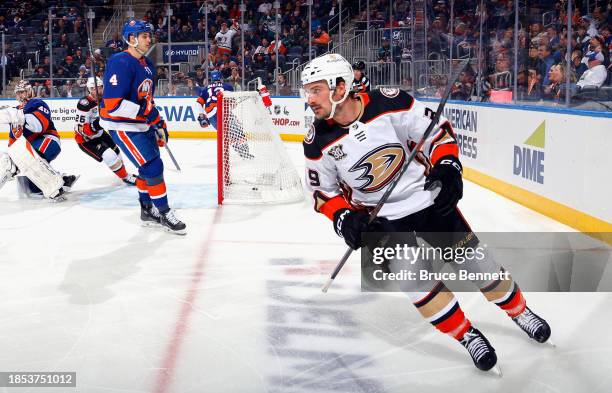 Sam Carrick of the Anaheim Ducks scores against the New York Islanders at 5:07 of the 3pat UBS Arena on December 13, 2023 in Elmont, New York.