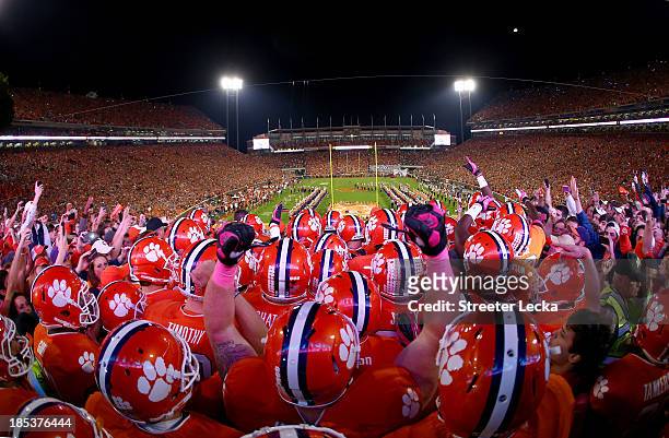 The Clemson Tigers enter the stadium before their game against the Florida State Seminoles at Memorial Stadium on October 19, 2013 in Clemson, South...