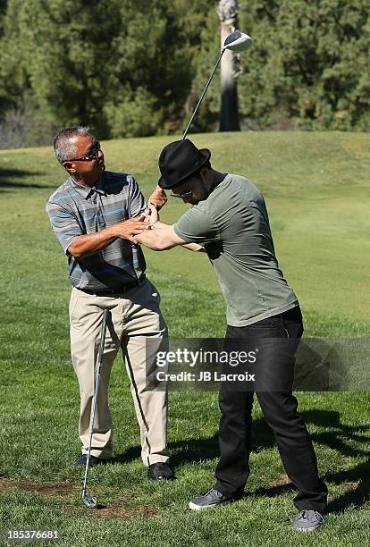 Gene Hori and Gavin DeGraw are seen golfing at the Malibu Golf Club during the Pinnacle Vodka and Live Nation?s Summer Sweepstakes event on October...
