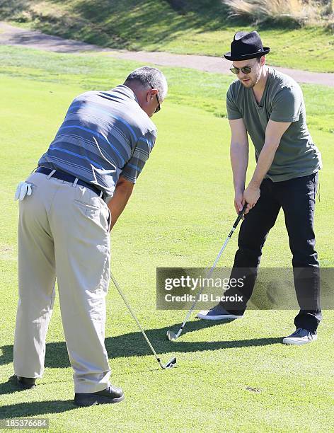 Gene Hori and Gavin DeGraw are seen golfing at the Malibu Golf Club during the Pinnacle Vodka and Live Nation?s Summer Sweepstakes event on October...