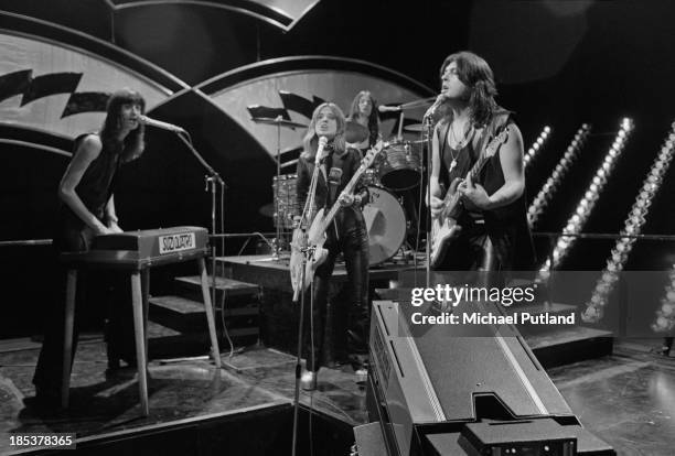 American rock singer Suzi Quatro and her group, miming to their single 'Daytona Demon' on the BBC TV music show 'Top Of The Pops', London, 8th...