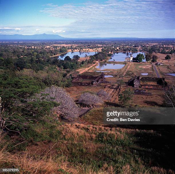 Panoramic view over the ruins of the magnificent Hindu Khmer temple of Wat Phu in Champasak Province in Southern Laos. Historians claim that the...