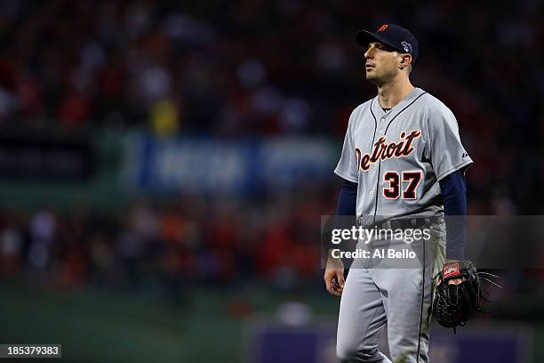 Max Scherzer of the Detroit Tigers walks to the dugout after being relieved in the seventh inning against the Boston Red Sox during Game Six of the...