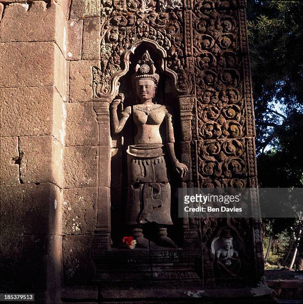 An intricate stone carving found in the ancient ruins of the Hindu Khmer temple of Wat Phu in Champasak Province in Southern Laos. Historians claim...