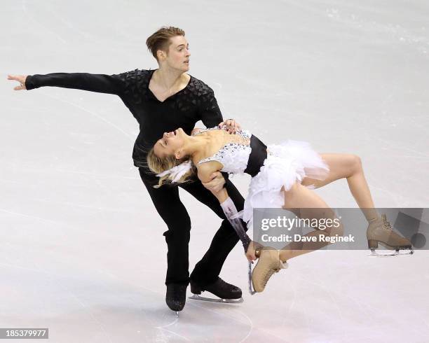 Pernelle Carron and Lloyd Jones of France perform during the free dance of day two at Skate America at Joe Louis Arena on October 19, 2013 in...