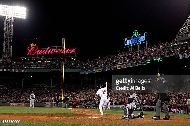 Shane Victorino of the Boston Red Sox celebrates after hitting a grand slam home run against Jose Veras of the Detroit Tigers in the seventh inning...