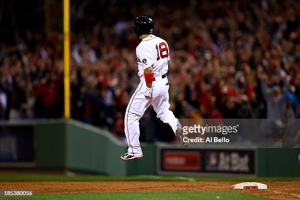 Shane Victorino of the Boston Red Sox celebrates after hitting a grand slam home run against Jose Veras of the Detroit Tigers in the seventh inning...