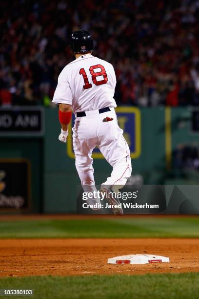 Shane Victorino of the Boston Red Sox celebrates after hitting a grand slam home run against Jose Veras of the Detroit Tigers in the seventh inning...