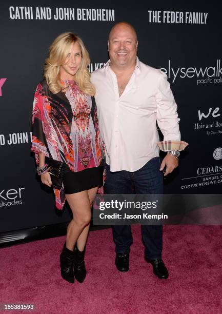 Actor Michael Chiklis and Michelle Chiklis attend Elyse Walker Presents The Pink Party 2013 hosted by Anne Hathaway at Barker Hangar on October 19,...