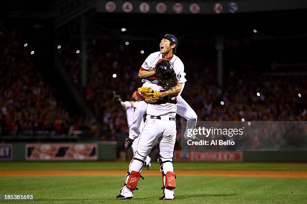 Koji Uehara Jarrod Saltalamacchia of the Boston Red Sox celebrate after defeating the Detroit Tigers in Game Six of the American League Championship...