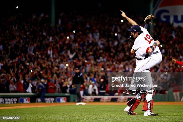 Koji Uehara Jarrod Saltalamacchia of the Boston Red Sox celebrate after defeating the Detroit Tigers in Game Six of the American League Championship...