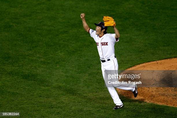 Koji Uehara the Boston Red Sox celebrates after defeating the Detroit Tigers in Game Six of the American League Championship Series at Fenway Park on...