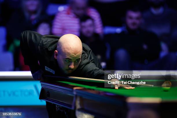 Luca Brecel of Belgium plays a shot in the second round match against Martin O'Donnell of England on day 3 of the 2023 BetVictor Scottish Open at the...