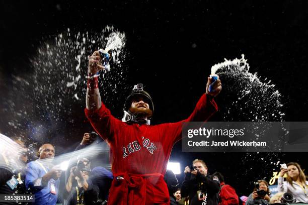 Jonny Gomes of the Boston Red Sox celebrates after defeating the Detroit Tigers in Game Six of the American League Championship Series at Fenway Park...