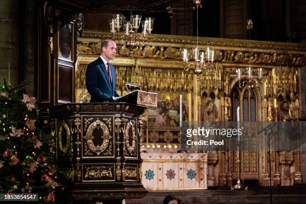 Prince William, Prince of Wales reads Luke 2: 1-7 during the Royal Carols - Together At Christmas service at Westminster Abbey on December 8, 2023 in...