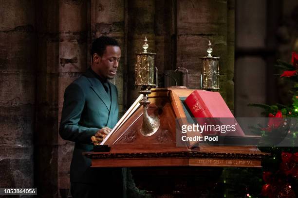 Micheal Ward gives a reading during the Royal Carols - Together At Christmas service at Westminster Abbey on December 8, 2023 in London, England.