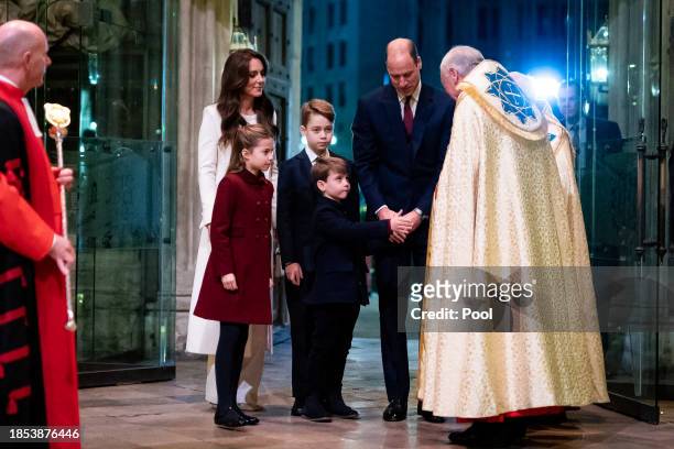 Catherine, Princess of Wales, Princess Charlotte, Prince George, Prince Louis, Prince William, Prince of Wales and the Reverend David Stanton during...