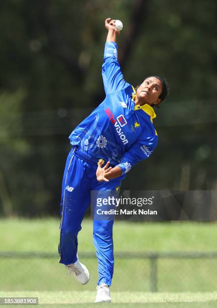 Jannatul Sumona of the ACT bowls during the WNCL match between ACT and Queensland at EPC Solar Park, on December 14 in Canberra, Australia.