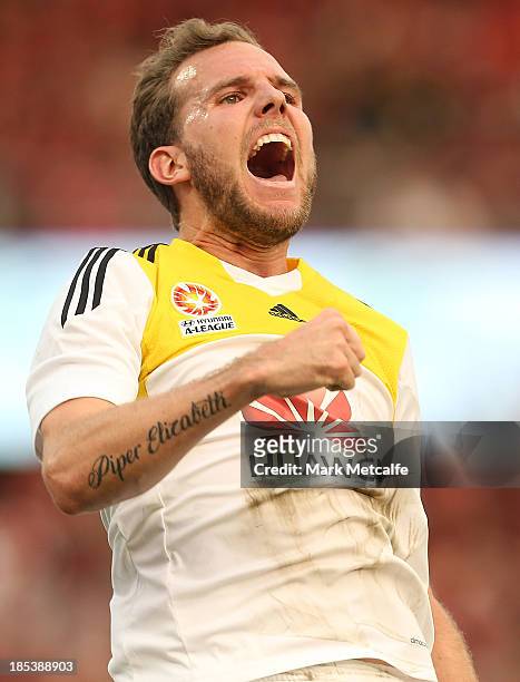 Jeremy Brockie of the Phoenix celebrates scoring a goal during the round two A-League match between the Western Sydney Wanderers and Wellington...
