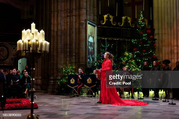 Freya Ridings sings Merry Christmas Everyone during the Royal Carols - Together At Christmas service at Westminster Abbey on December 8, 2023 in...